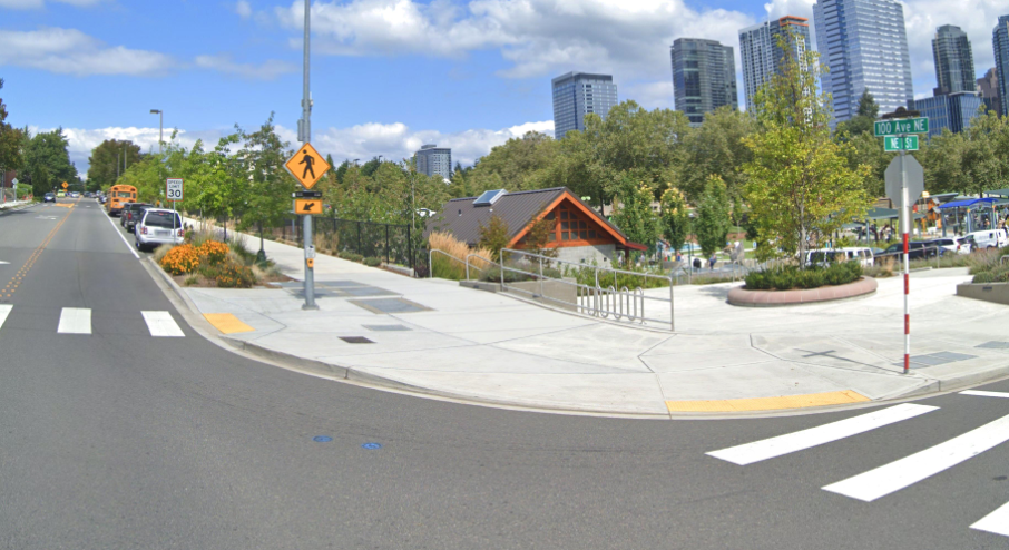 Picture of an intersection that has a speed limit sign