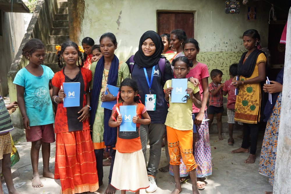 Photos of the GDG and Women Techmakers Chennai volunteers teaching technology to girls in the community.