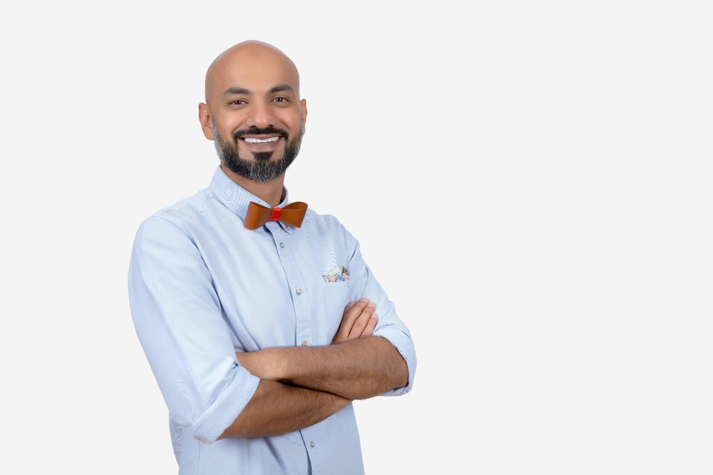 Founder of Lamsa, Badr Ward, stands, smiling, with his arms folded