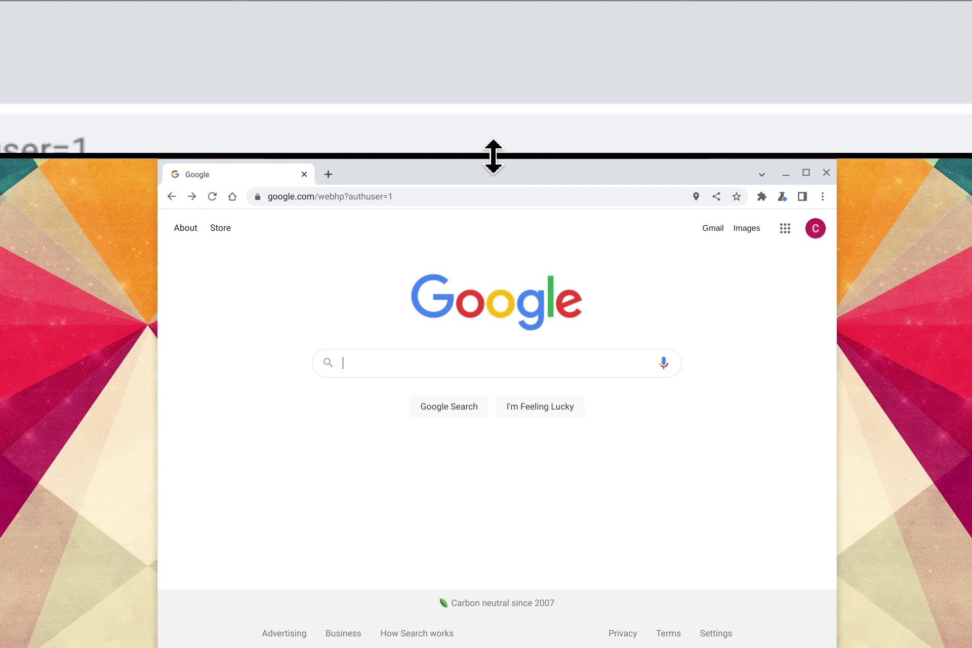 Animation of a resizing the docked magnifier. The user grabs the bar at the bottom of the magnified area and drags it down so that a larger part of the screen is shown magnified.