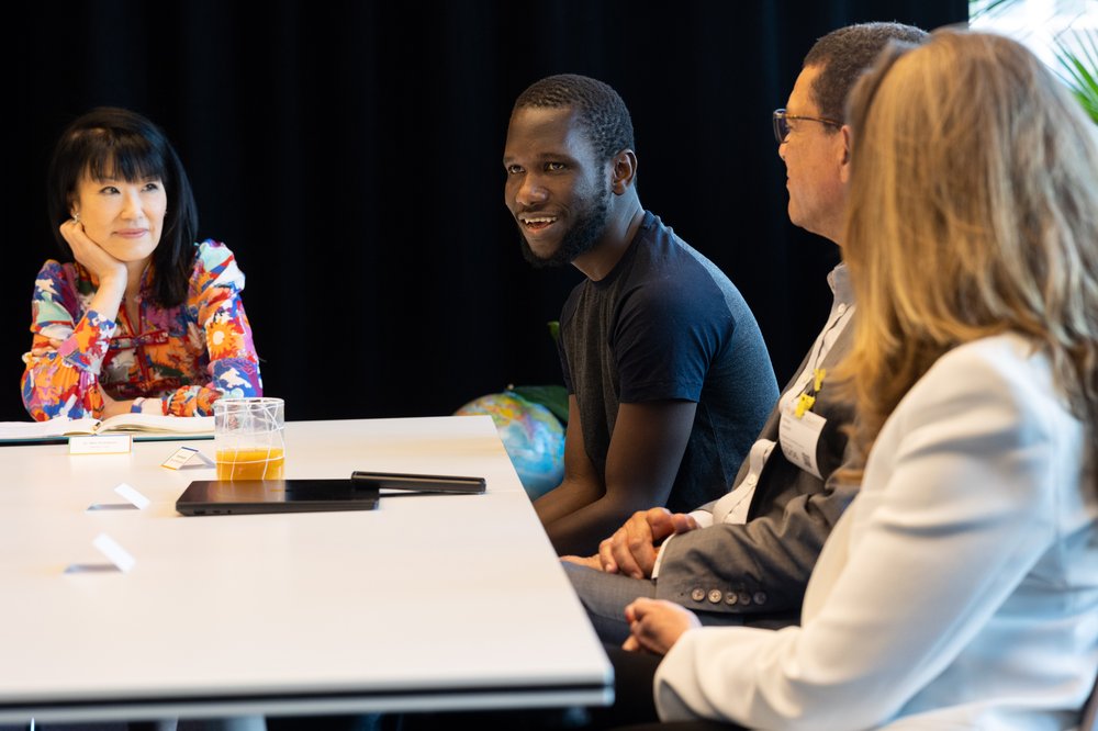 Ousman, a Certificate graduate, speaks to members of the Employer Consortium at an event at Google.