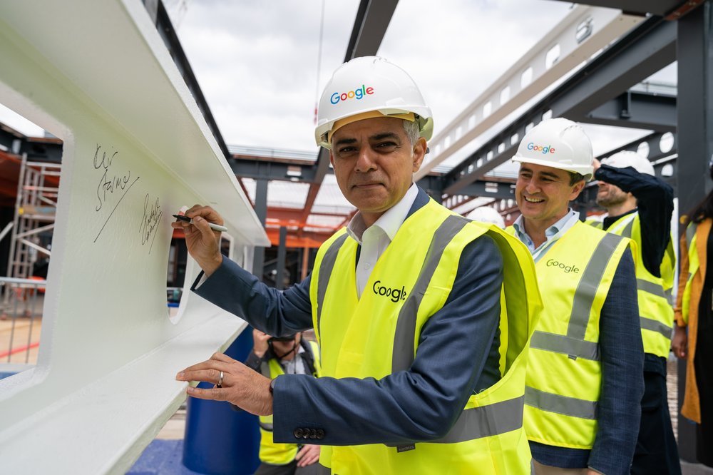 Sadiq Khan, London Mayor signing a whiteboard