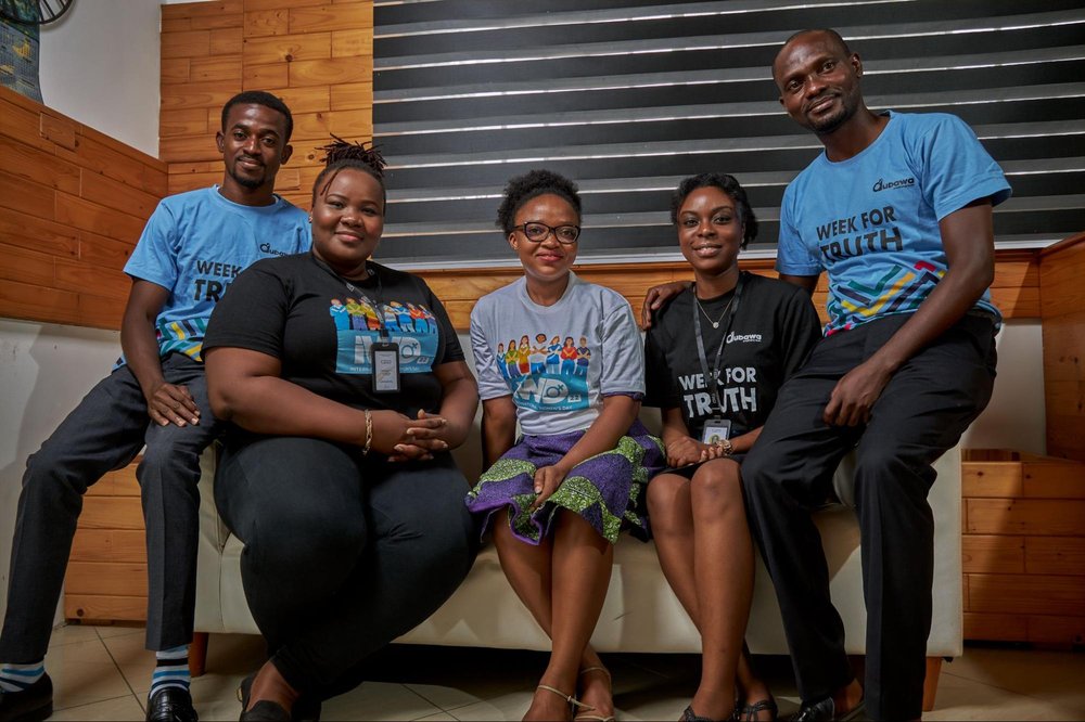 Picture shows a group of five people who make up the team at the Dubawa Centre for Journalism Innovation and Development, who will automate radio fact-checking.